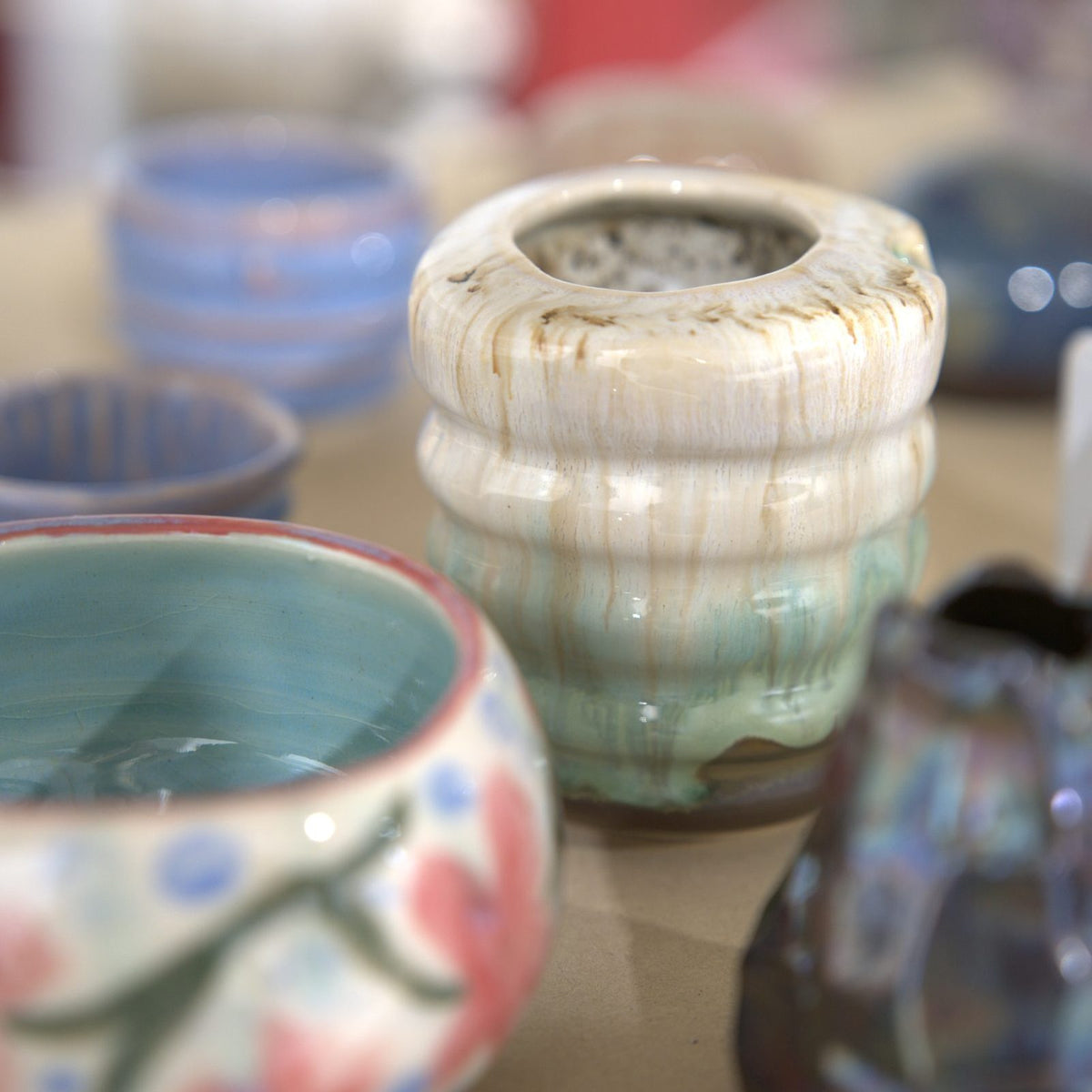 Finished glazed pottery on display at Claya pottery studio in RiNo, Denver