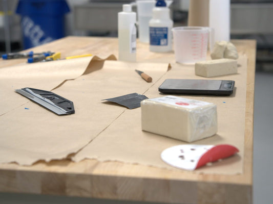 Pottery worktable with clay and tools at Claya studio in RiNo, Denver