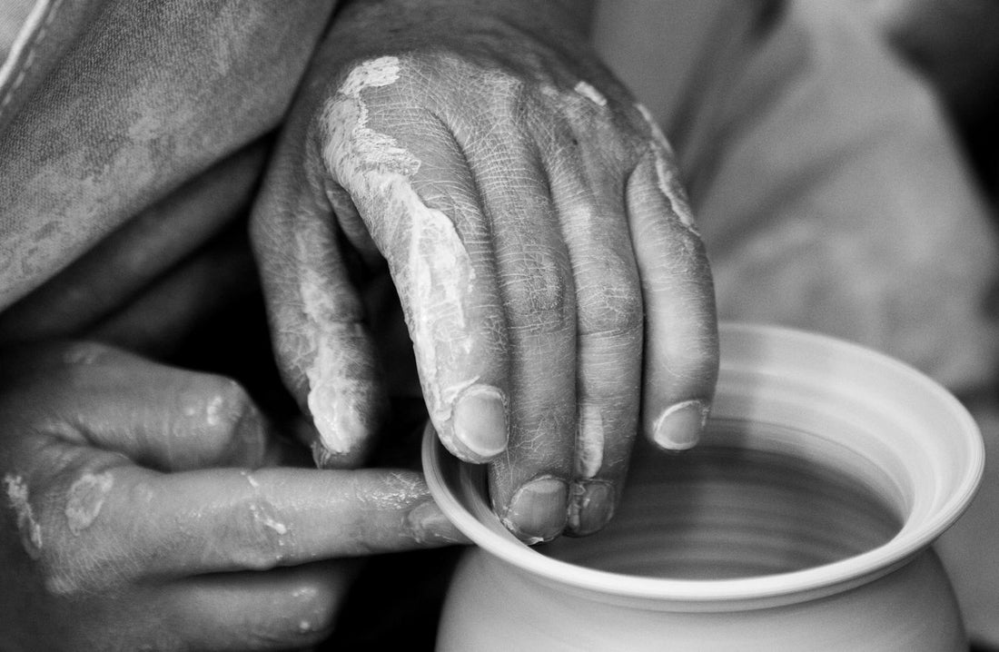 Artistic close-up of pottery wheel work