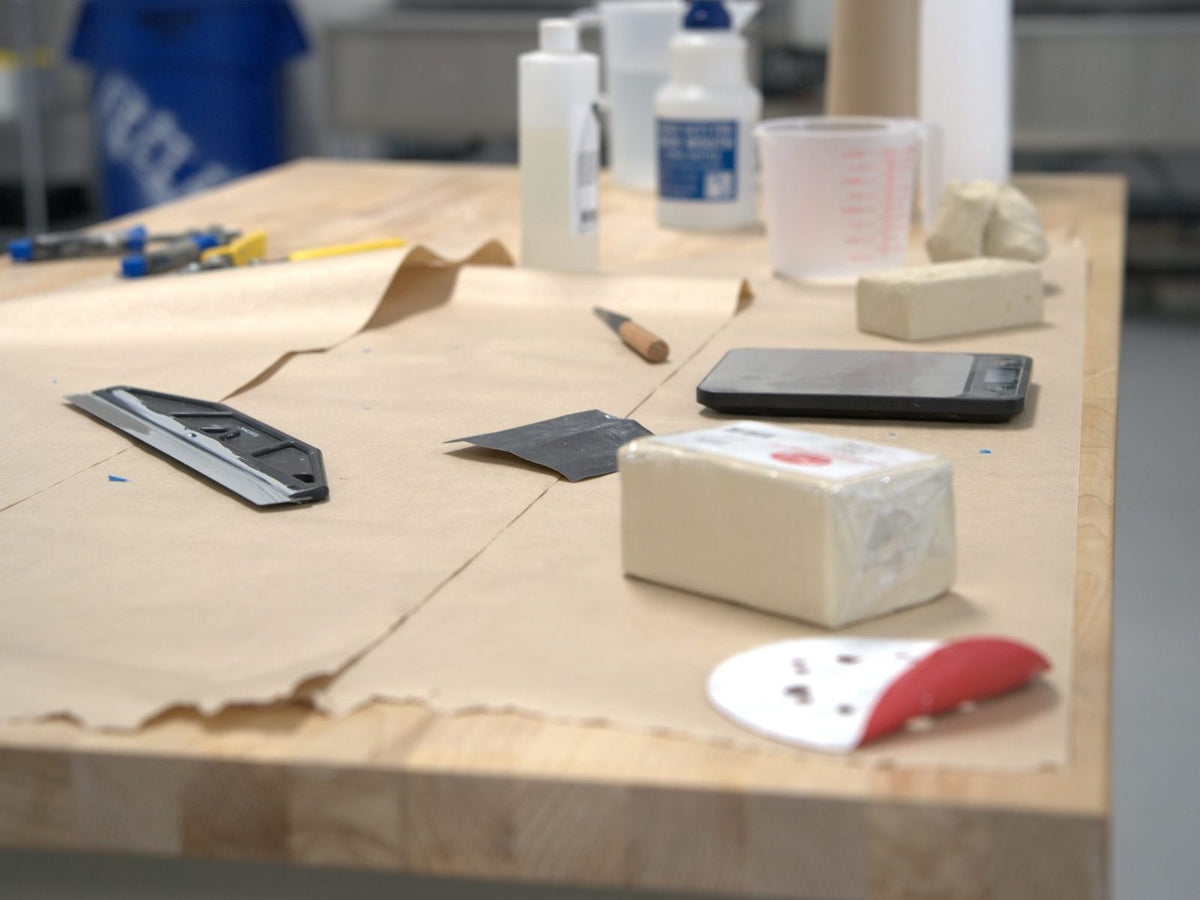 Pottery worktable with clay and tools at Claya studio in RiNo, Denver