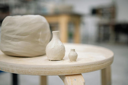 Altered vases thrown by intermediate students at Claya pottery studio in Denver